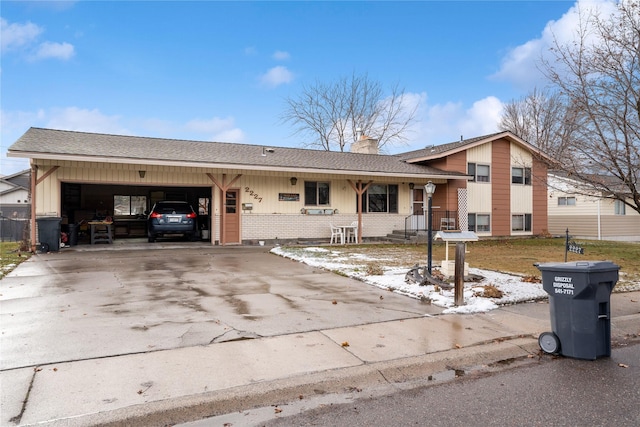 view of front of home featuring a carport