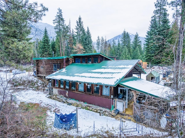 view of front of home with a mountain view