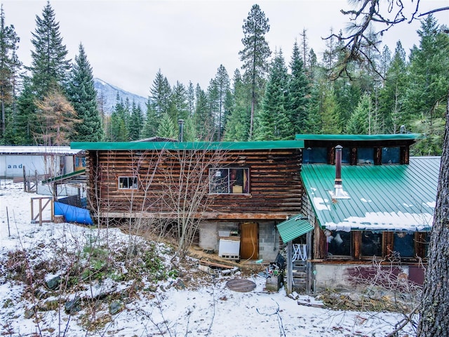 view of snow covered property