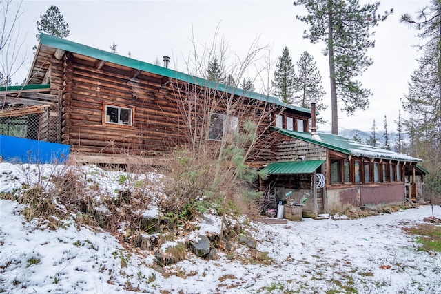 view of snow covered property