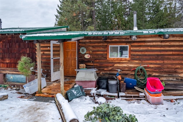 view of snow covered patio