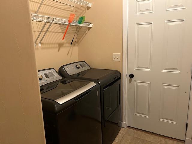 laundry area featuring washer and clothes dryer