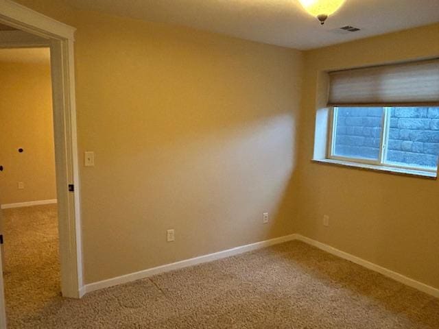 view of carpeted spare room