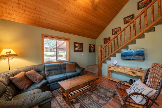 living room featuring hardwood / wood-style floors, wooden ceiling, and lofted ceiling