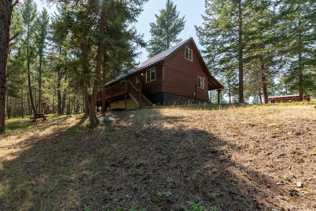 view of home's exterior with a deck