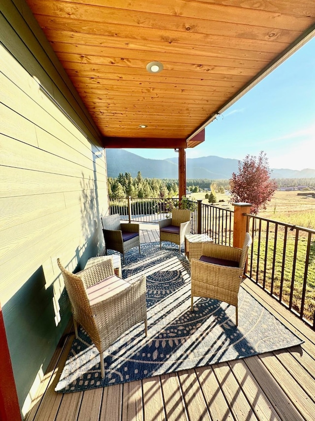 deck featuring a mountain view