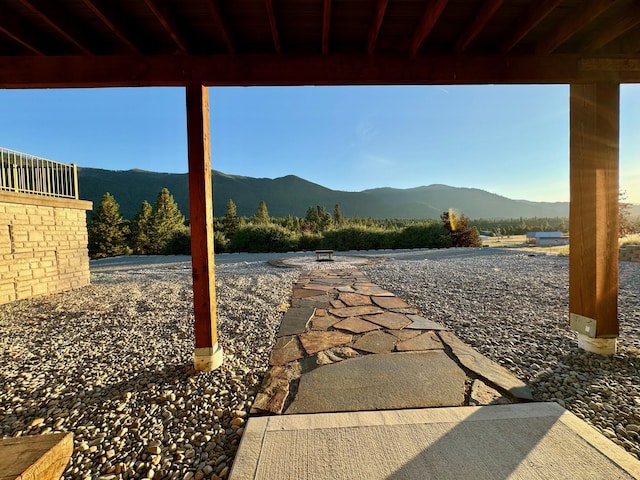 view of patio / terrace featuring a mountain view