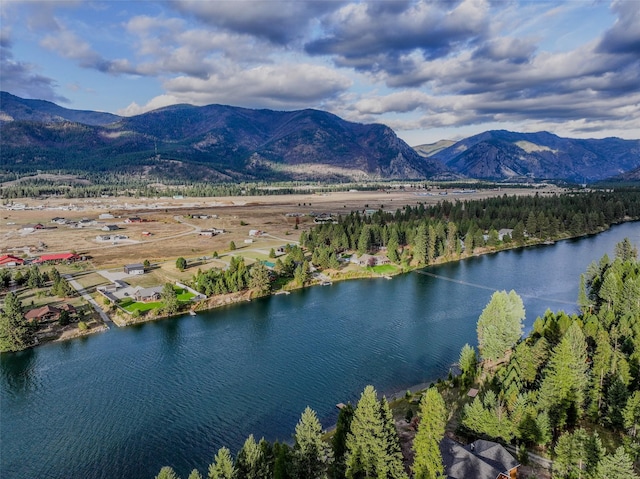 bird's eye view with a water and mountain view