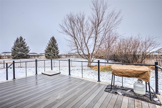 view of snow covered deck