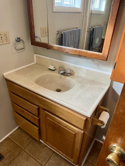 bathroom featuring vanity and tile patterned floors