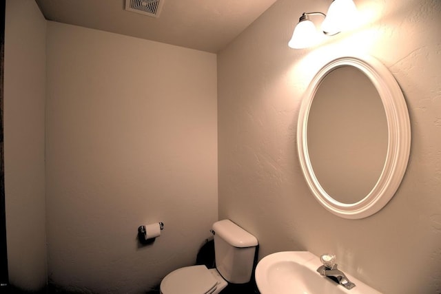 7AND9 Stratford Dr, Kalispell, MT 59901 - bathroom with toilet and sink