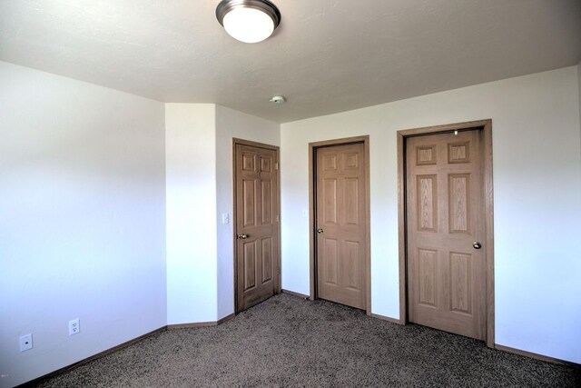 7AND9 Stratford Dr, Kalispell, MT 59901 - unfurnished bedroom with carpet