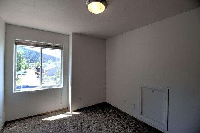 7AND9 Stratford Dr, Kalispell, MT 59901 - view of carpeted empty room