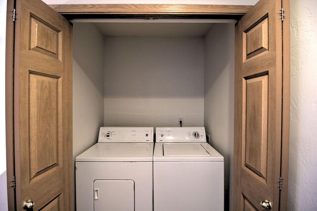 7AND9 Stratford Dr, Kalispell, MT 59901 - laundry room featuring separate washer and dryer