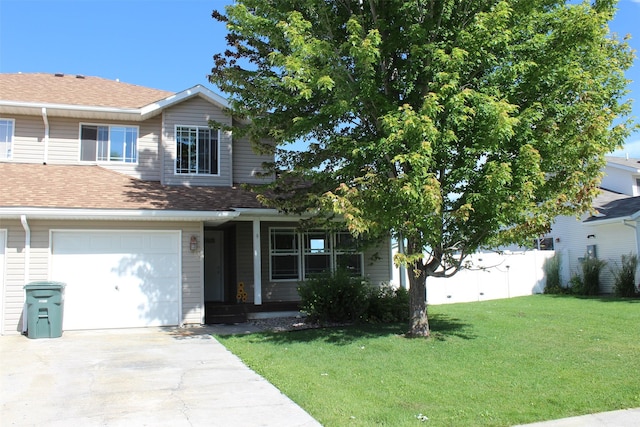 7AND9 Stratford Dr, Kalispell, MT 59901 - view of front of home with a front yard and a garage