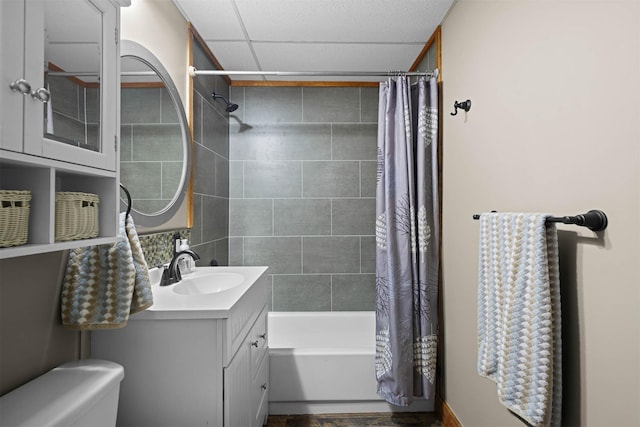 full bathroom featuring shower / bath combination with curtain, vanity, and toilet