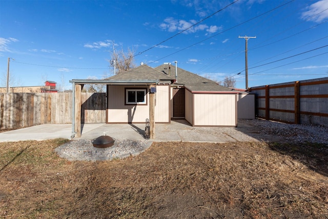 rear view of property with a patio