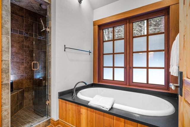 2120 Iron Horse Dr Unit 11, Whitefish, MT 59937 - bathroom with a garden tub and a shower stall