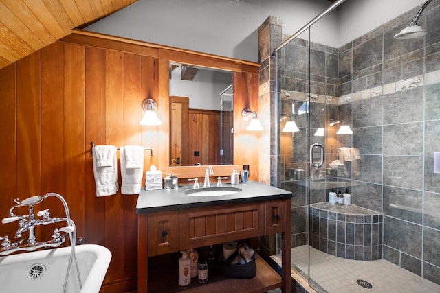2120 Iron Horse Dr Unit 11, Whitefish, MT 59937 - bathroom featuring a stall shower, vanity, a soaking tub, and wood walls