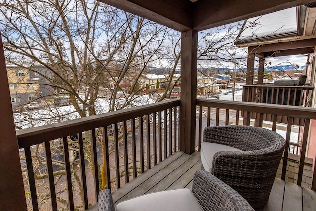 view of snow covered deck