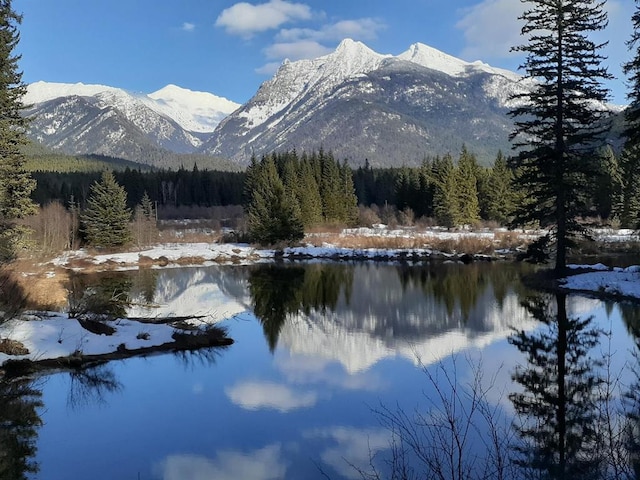 view of mountain feature featuring a water view