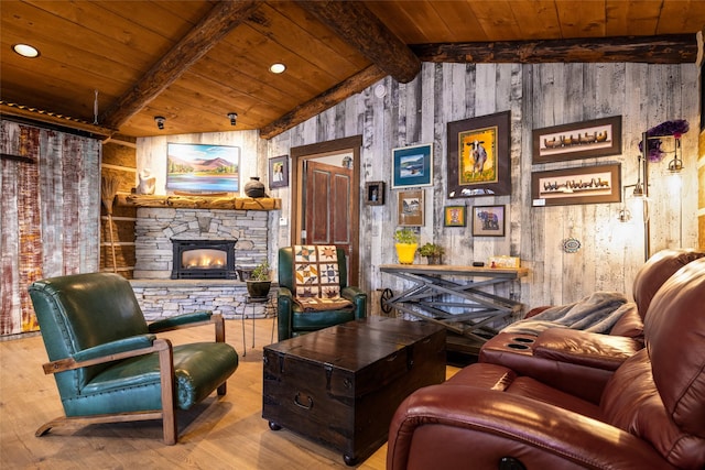 living area featuring a fireplace, wooden ceiling, lofted ceiling with beams, and wood-type flooring