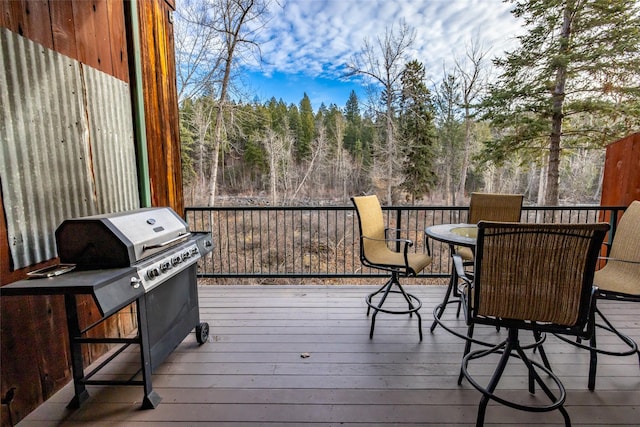 wooden deck with area for grilling