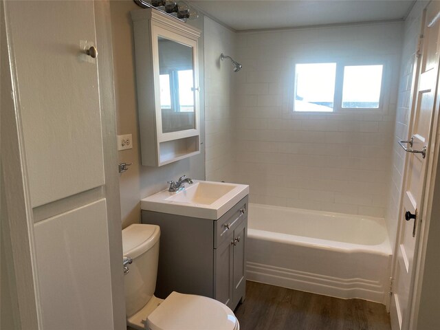 empty room with a baseboard radiator and dark hardwood / wood-style floors