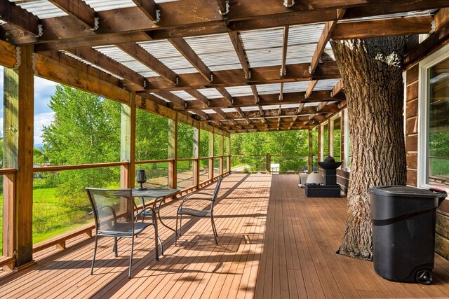 wooden terrace featuring a pergola