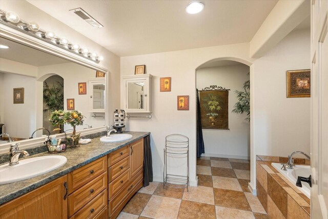 bathroom with a tub to relax in