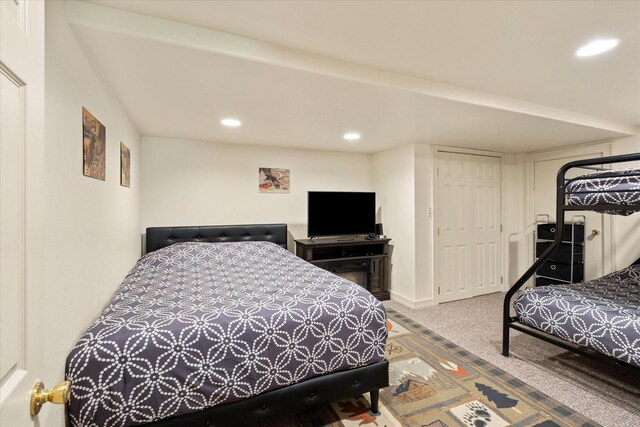 recreation room featuring light carpet