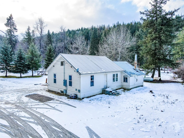 view of snow covered property