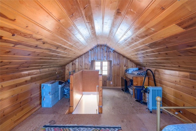 additional living space with wooden walls, wood ceiling, and vaulted ceiling