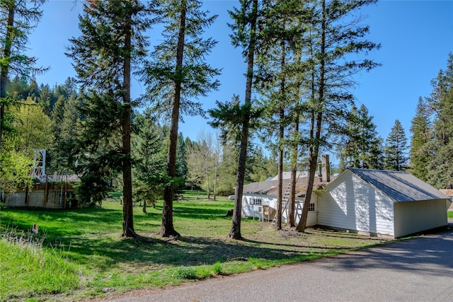 view of property exterior featuring a yard