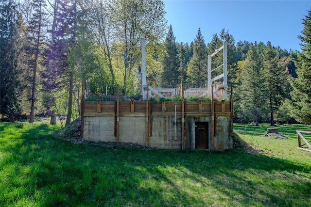 view of outbuilding with a wooded view