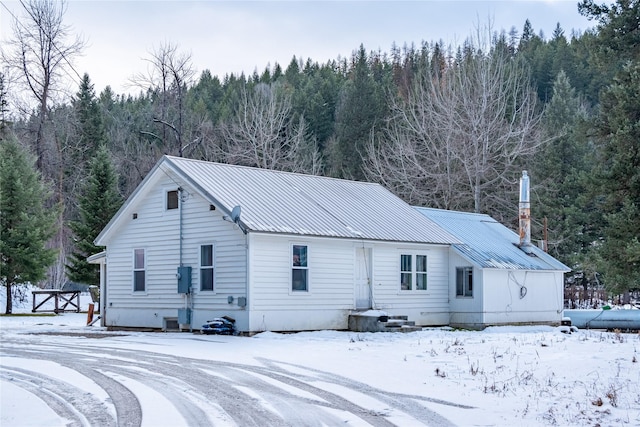 view of snow covered property