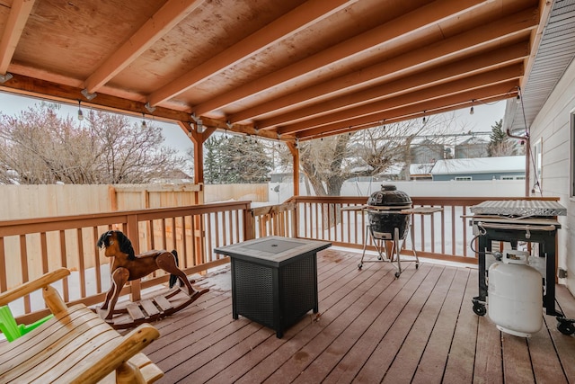 view of snow covered deck