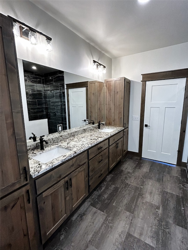 bathroom with vanity and walk in shower