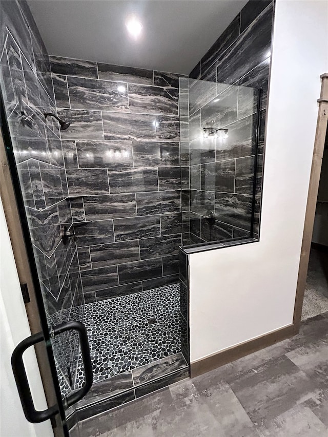 bathroom featuring an enclosed shower