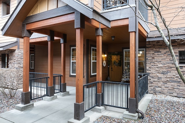 property entrance featuring covered porch