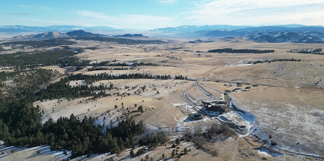 drone / aerial view featuring a mountain view