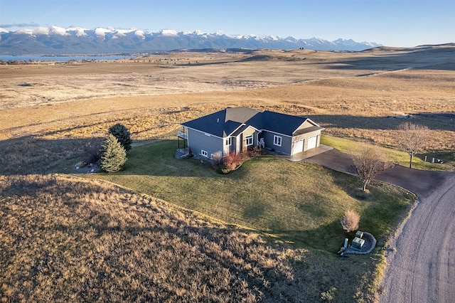 drone / aerial view featuring a mountain view