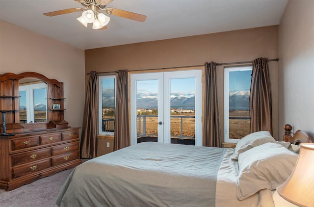 carpeted bedroom with access to exterior and ceiling fan