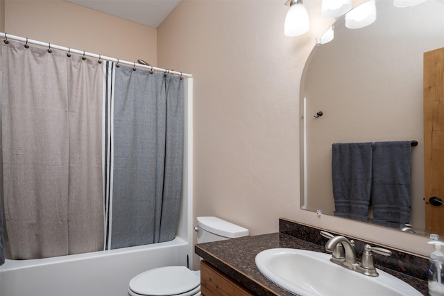 full bathroom featuring vanity, shower / bath combo, and toilet