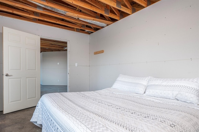 bedroom featuring concrete flooring