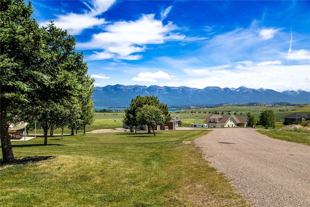 mountain view featuring a rural view