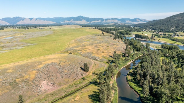 aerial view with a rural view and a water and mountain view