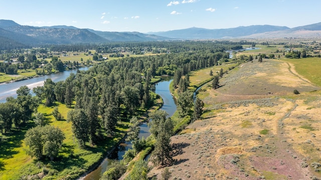 aerial view with a water and mountain view