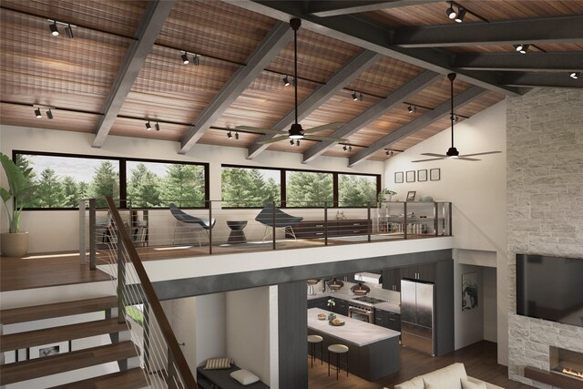 stairs with ceiling fan, wood ceiling, and hardwood / wood-style flooring