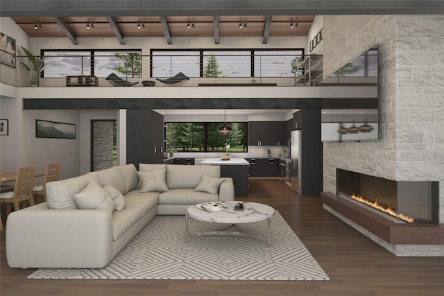 living room featuring beam ceiling, a high ceiling, dark hardwood / wood-style flooring, a fireplace, and wood ceiling